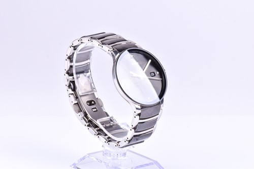 Lot 218 - A Rado Centrix polished wristwatch, the...