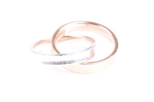 Lot 405 - A Tiffany interlocking circles ring, the rose...