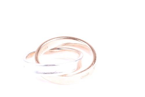 Lot 405 - A Tiffany interlocking circles ring, the rose...