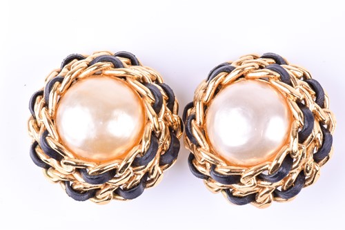 Lot 717 - Chanel. A pair of gold tone and faux pearl...