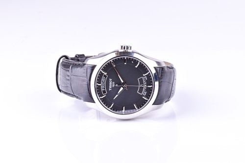 Lot 203 - A Tissot automatic stainless steel wristwatch,...