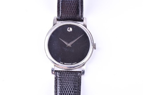 Lot 470 - A Movado stainless steel wristwatch, the black...