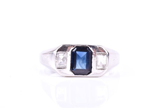 Lot 731 - An unusual diamond and sapphire ring, set with...