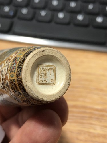 Lot 211 - A pair of miniature Yabu Meizan satsuma vases,...