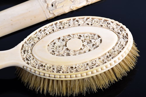 Lot 282 - A good pair of Canton carved ivory hair...