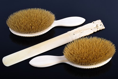 Lot 282 - A good pair of Canton carved ivory hair...