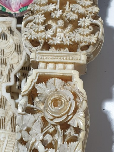 Lot 212 - A Chinese carved ivory fan, Canton circa 1850,...