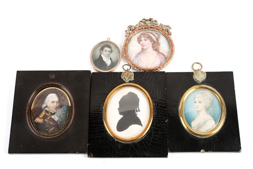 Lot 394 - Four 19th century portrait miniatures on ivory,...