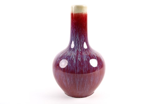 Lot 233 - A Chinese flambe bottle vase, the red body...