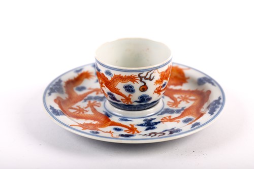 Lot 247 - A Chinese blue and iron red dragon bowl and...