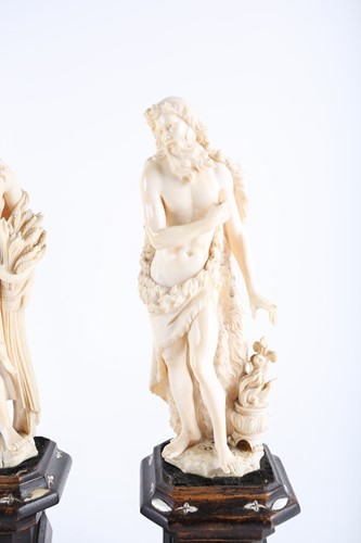 Lot 397 - A group of four 19th century European ivory...