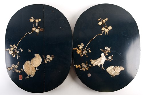 Lot 224 - A pair of Japanese lacquered and inlaid oval...