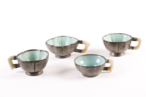 Lot 231 - Four Chinese inscribed pewter, Yixing and jade...
