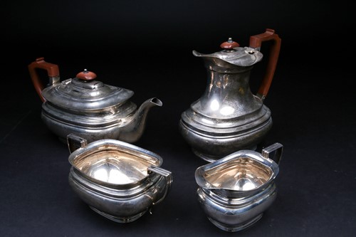 Lot 623 - A George VI silver four-piece tea set,...