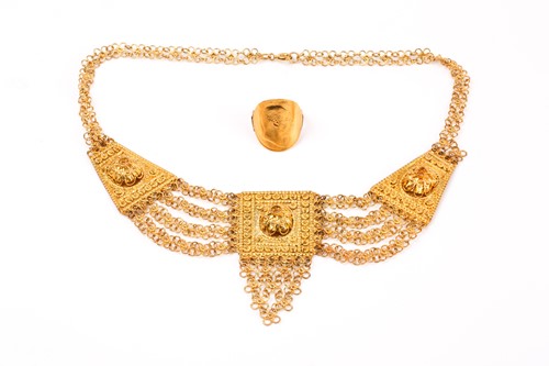 Lot 857 - An unusual gilt metal chain-link and filigree...