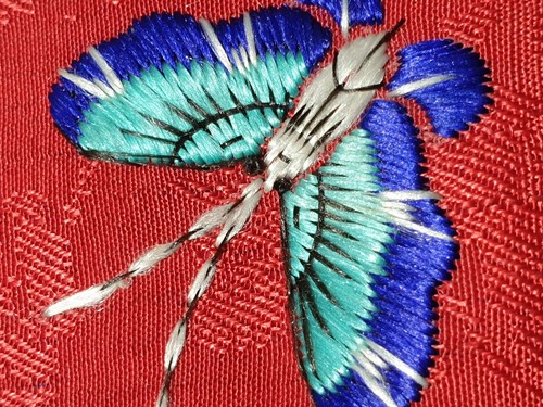Lot 275 - A Chinese embroidered silk panel, 20th century,...