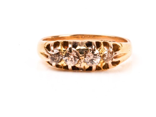 Lot 873 - An 18ct yellow gold and brown diamond ring,...