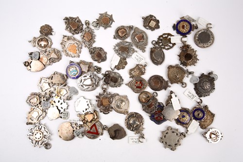 Lot 757 - A collection of 46 assorted silver fobs and...