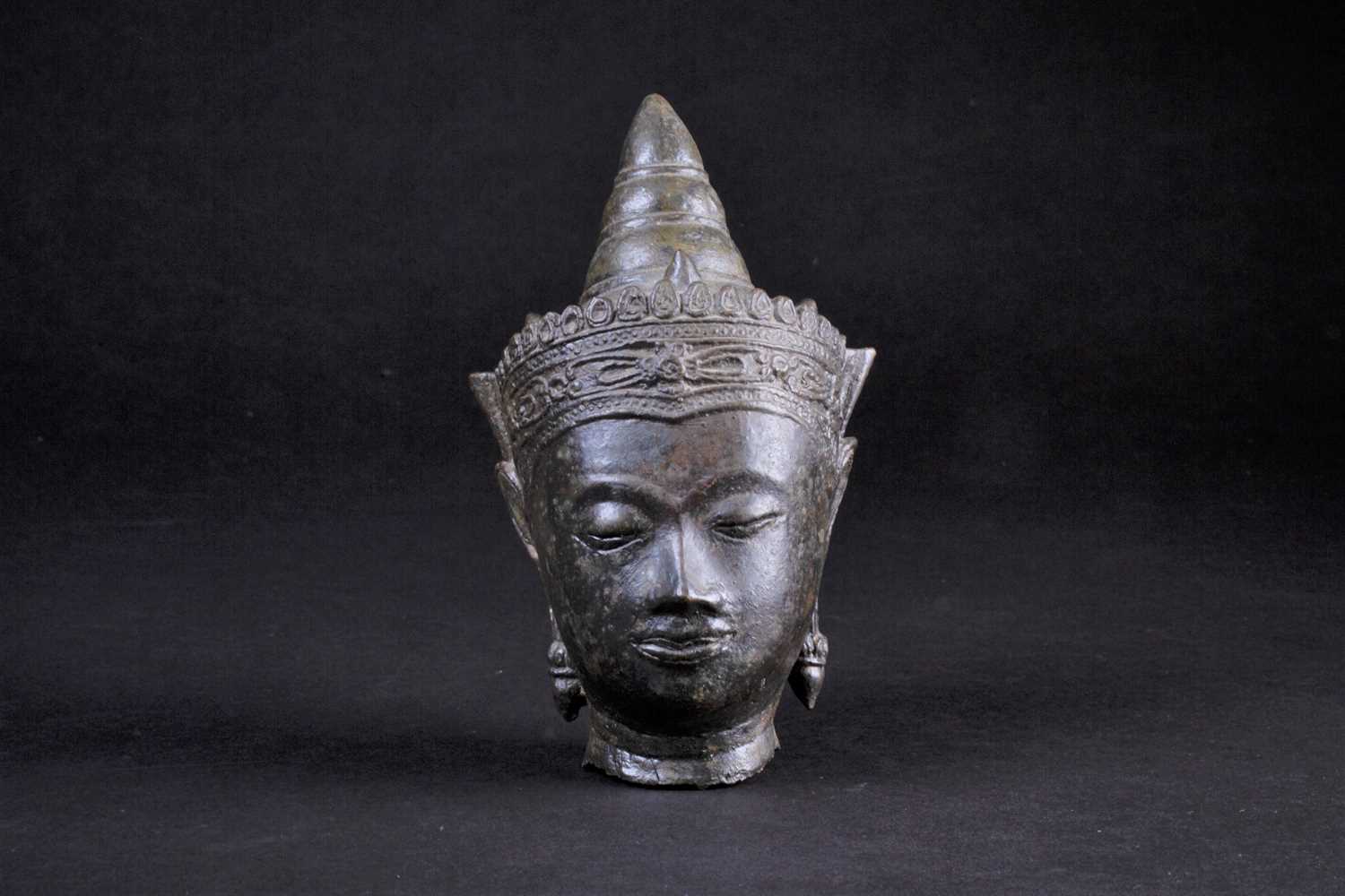 Lot 45 - A Cambodian bronze bust of Buddha, 19th...