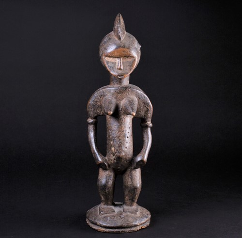 Lot 2 - A Senufo female standing figure, Ivory Coast,...