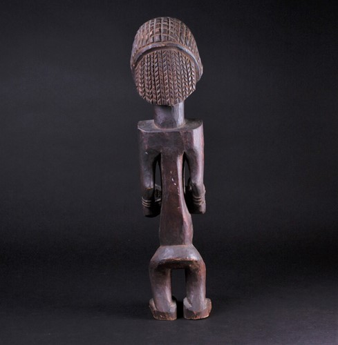 Lot 51 - A carved wood Bembe standing maternity figure,...