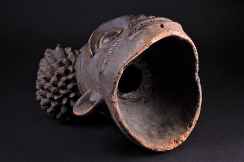 Lot 73 - A Bamum Bangwa carved wood mask, Cameroon, the...