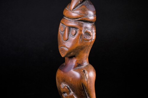 Lot 32 - A Malaysian carved wood standing figure of a...