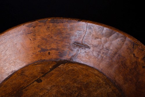 Lot 28 - An Indian carved wood bowl, the rim...