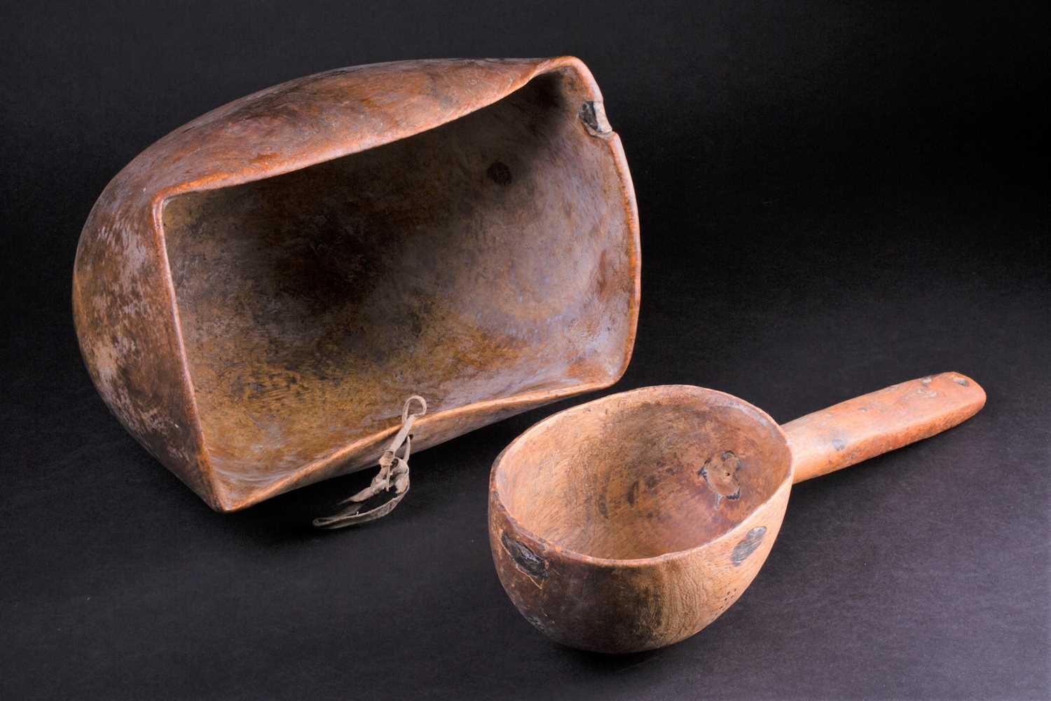 Lot 8 - A Maasai hardwood bowl and scoop, Kenya, the...