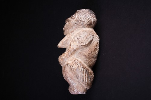 Lot 9 - A carved stone Nomoli figure, Sierra Leone,...