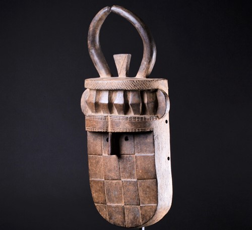Lot 62 - A Baule carved wood mask, Ivory Coast, with...