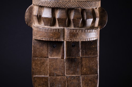 Lot 62 - A Baule carved wood mask, Ivory Coast, with...