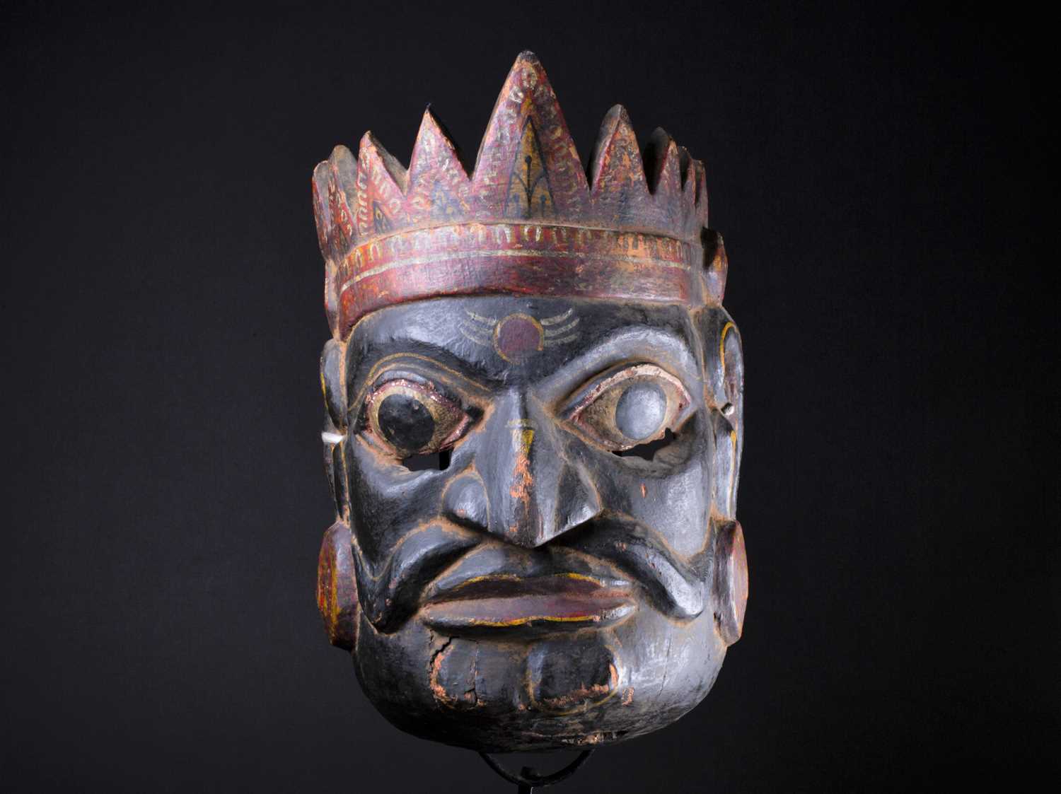 Lot 57 - An Indonesian carved and painted ceremonial...