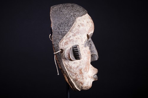 Lot 13 - An Igbo mask, Nigeria, with short coiffure,...