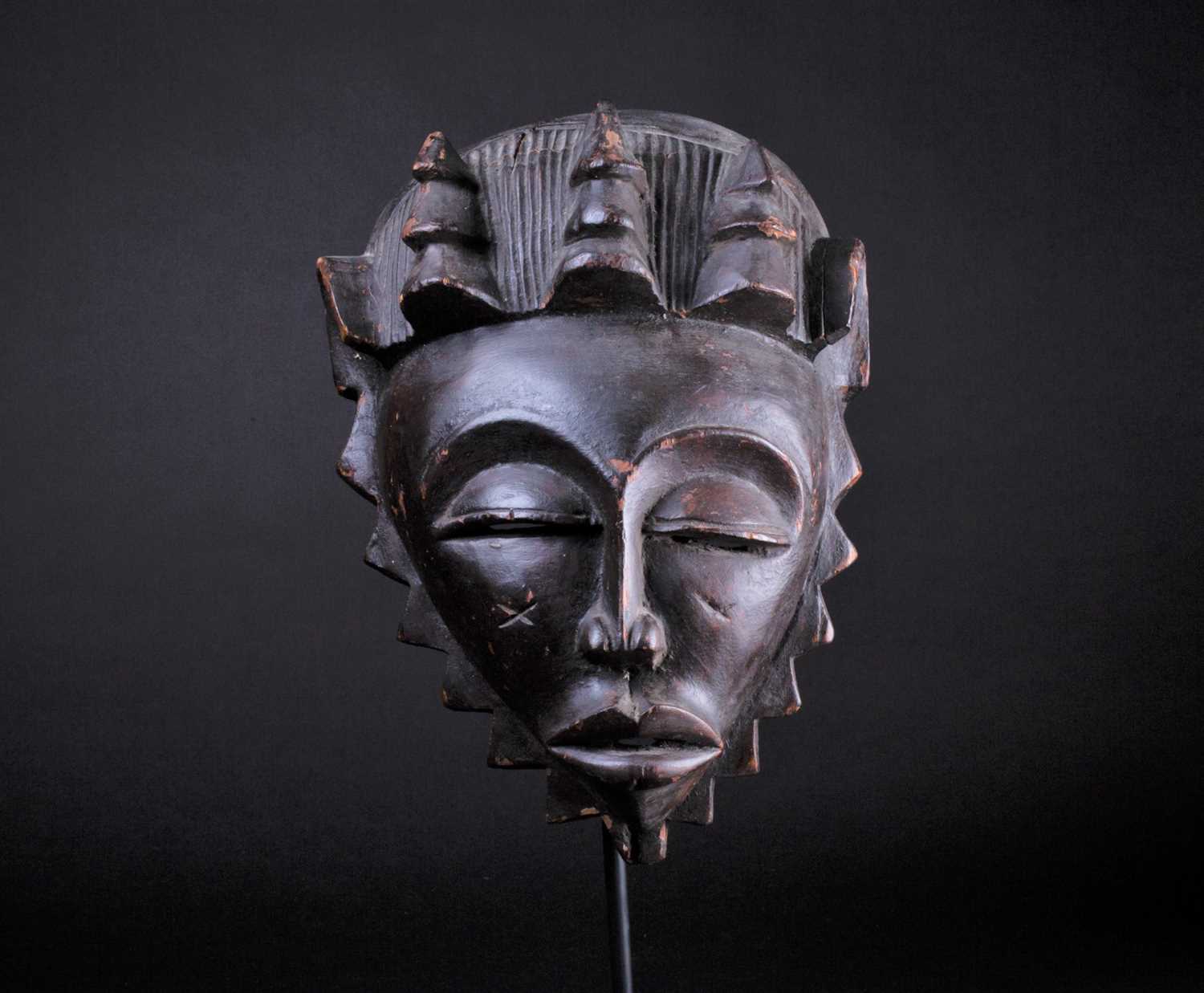 Lot 44 - A Baule female mask, Ivory Coast, with...