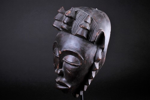 Lot 44 - A Baule female mask, Ivory Coast, with...