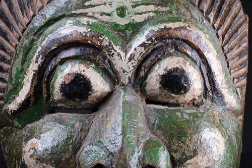 Lot 30 - An Indonesian carved and painted wood mask,...