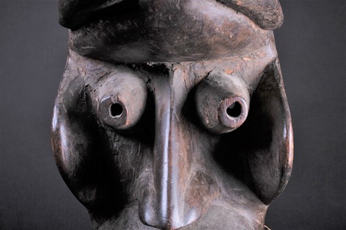 Lot 67 - A Dan mask, Sierra Leone, with a pronounced...