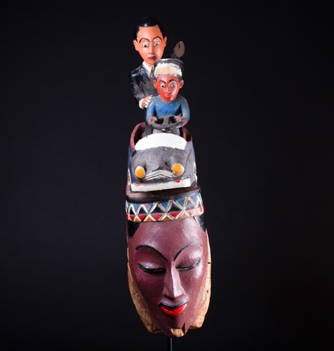 Lot 6 - A Colon mask, Nigeria, the female mask painted...