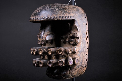 Lot 74 - A Grebo Kru mask, Liberia, the pronounced brow...