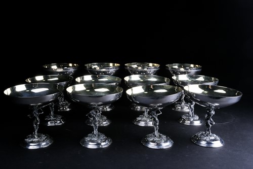 Lot 424 - A set of eight Lambidis silver-plated coupes,...