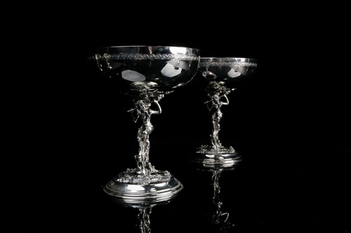 Lot 424 - A set of eight Lambidis silver-plated coupes,...