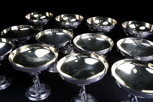 Lot 424 - A set of eight Lambidis silver-plated coupes,...