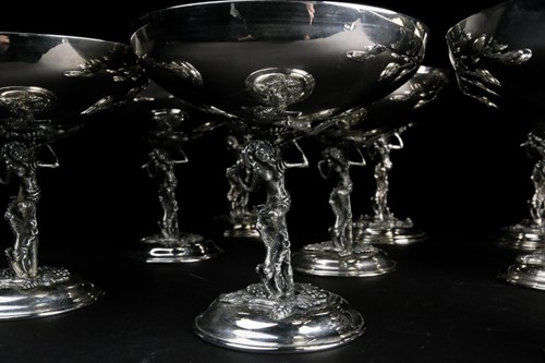 Lot 424 - A set of eight Lambidis silver-plated coupes,...