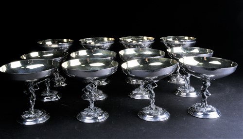 Lot 424 - A set of eight Lambidis silver-plated coupes,...