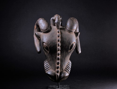 Lot 55 - A Bamileke zoomorphic Buffalo mask, Cameroon,...