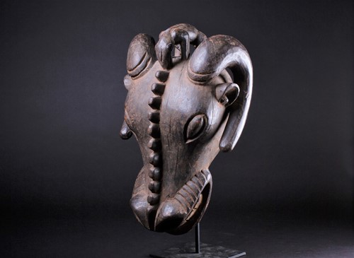 Lot 55 - A Bamileke zoomorphic Buffalo mask, Cameroon,...