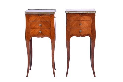 Lot 101 - A pair of French kingwood and marble topped...