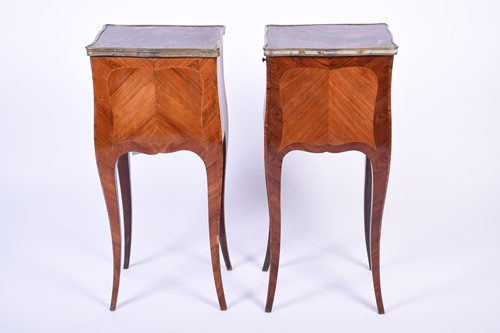 Lot 101 - A pair of French kingwood and marble topped...