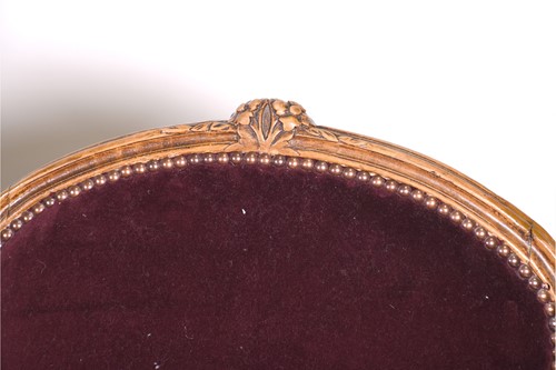 Lot 105 - A French carved, gilded and upholstered...